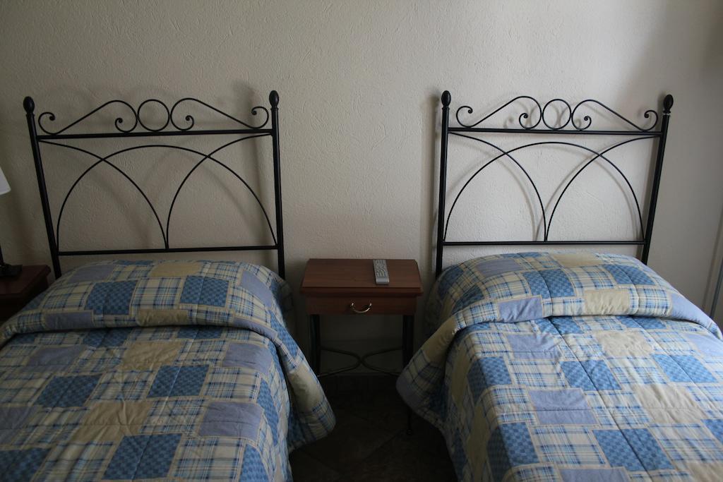 Hotel Porta Santa Maria Busca Pokoj fotografie